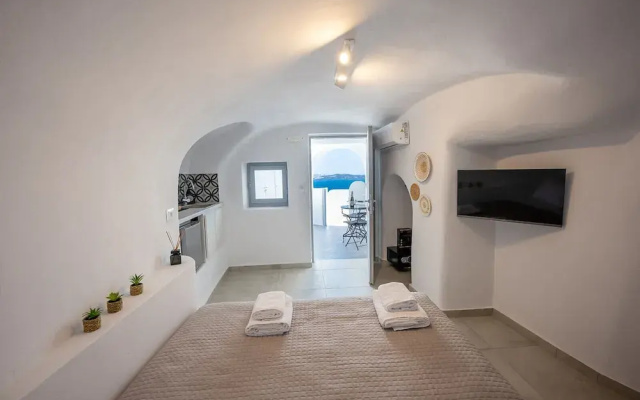 Three Domes Oia - an Iconic Collection