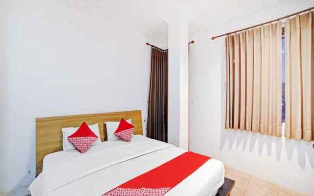 OYO 90450 Scala Inn