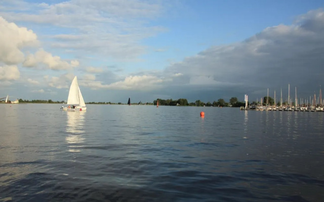 Nice Holiday Home on the Water in Grou