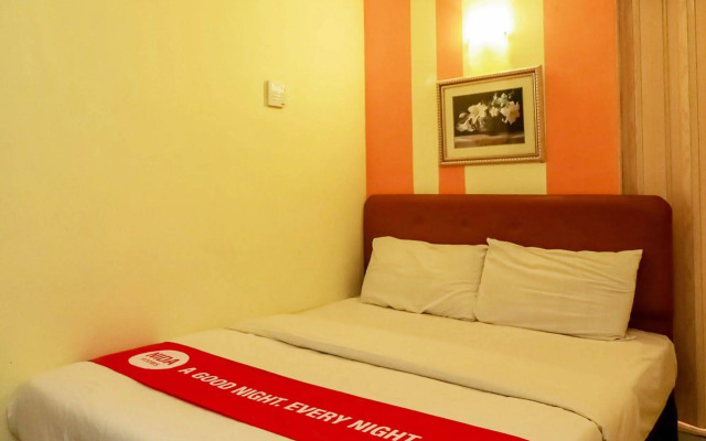 NIDA Rooms Ratchathewi Siam Orchid