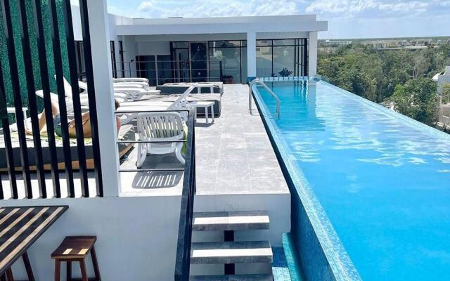 Fresh and Stylish Studio Aldea Zama rooftop pool Mya 109