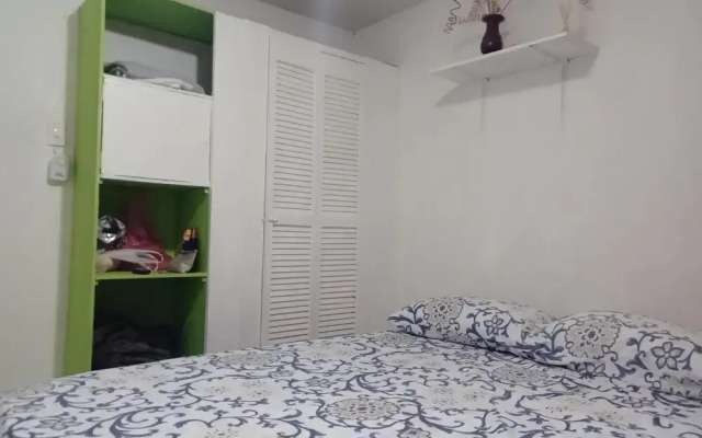 Room in Guest Room - Green Sea Inn in the San Luis Sector