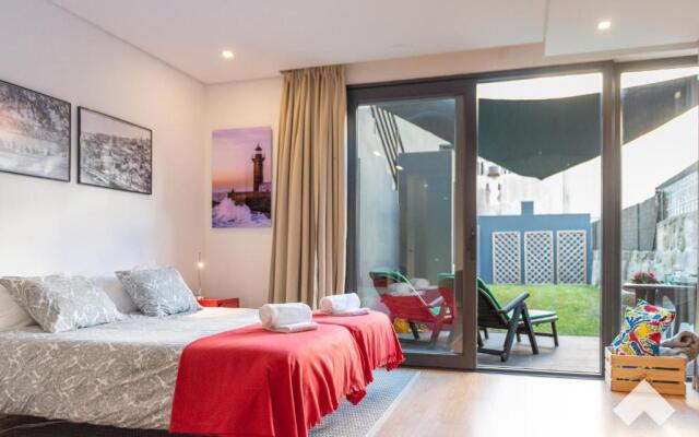 Light-Filled Apartment with Garden • Downtown