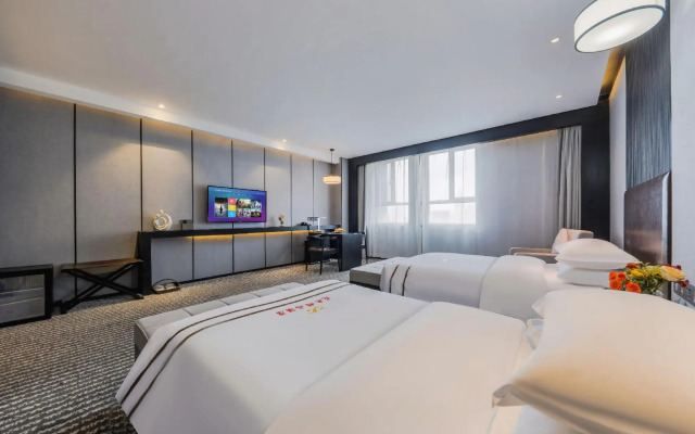 Baishichang Longquan Hotel (Urumqi International Grand Bazamin Street)