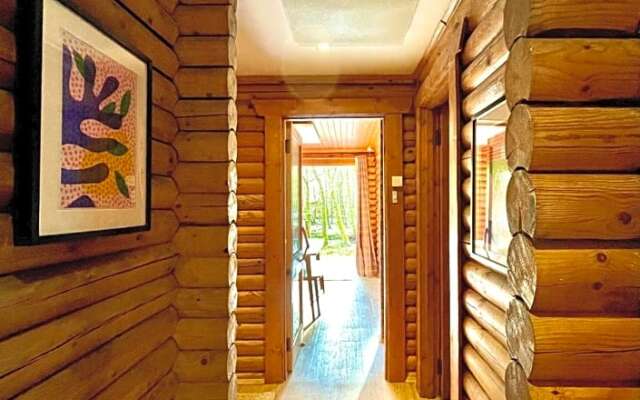 Riverside log cabins
