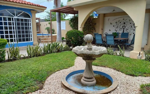 Room in Apartment - Cozy Mérida Retreat With Pool & Garden View