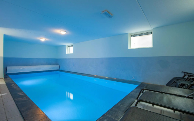 Luxurious villa with indoor swimming pool and sun shower