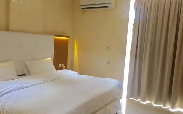 Capital O 338 Asian Hotel