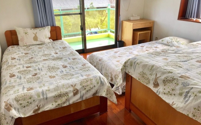 Lulu Garden – Guest Rooms – Onna