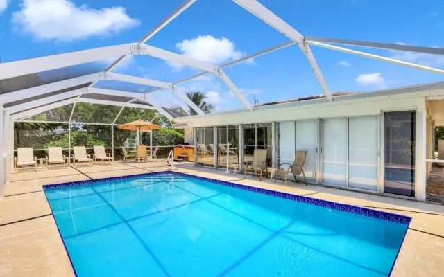 Cozy Home With Sunroom, Pool and Steps to Beach