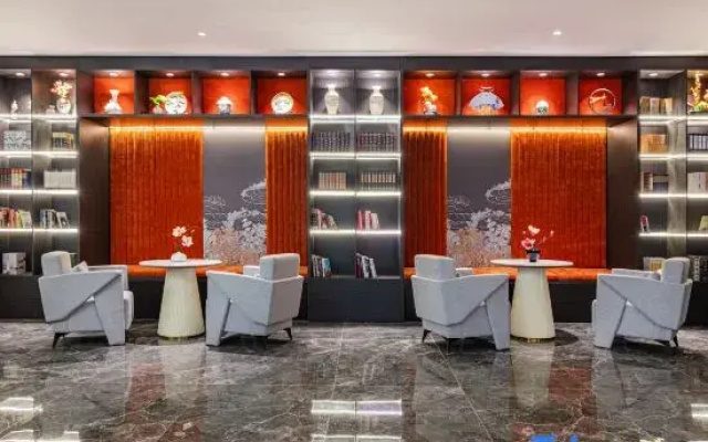 Rezen Dong Hotel (Tianjin Aoti Zhongxin Wangdingdi Subway Station)