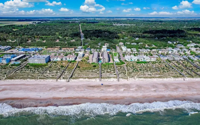 Newly Remodeled Oceanfront Condo with Salt Water Pool and Private Walkway to Beach by RedAwning