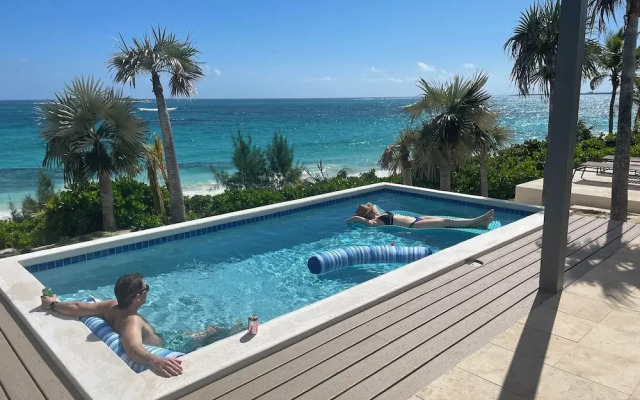 Seven Palms Serenity: Beachfront Oasis