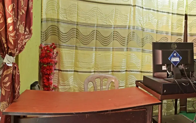 OYO 90664 Rabi Hotel