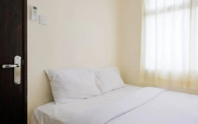 Homey 2BR at Serpong Greenview Apartment