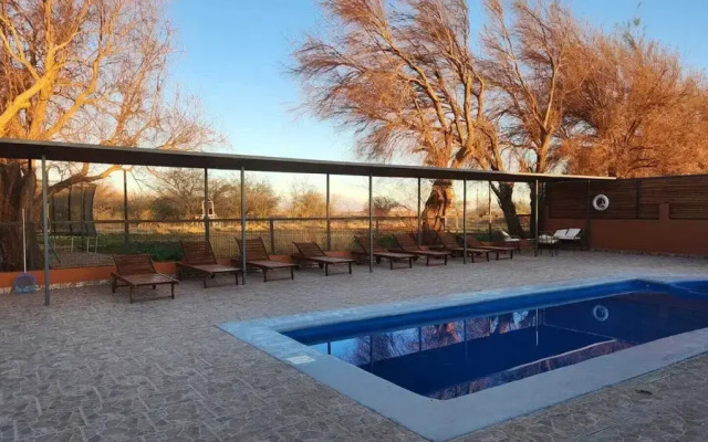 Peumayen Atacama / Hostal & Cabaña