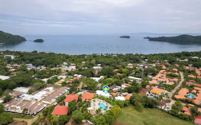 Modern Top-Floor Condo with Panoramic Views and Community Pool