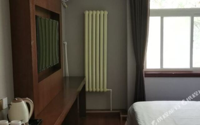 Xincheng Zhijia Business Hotel