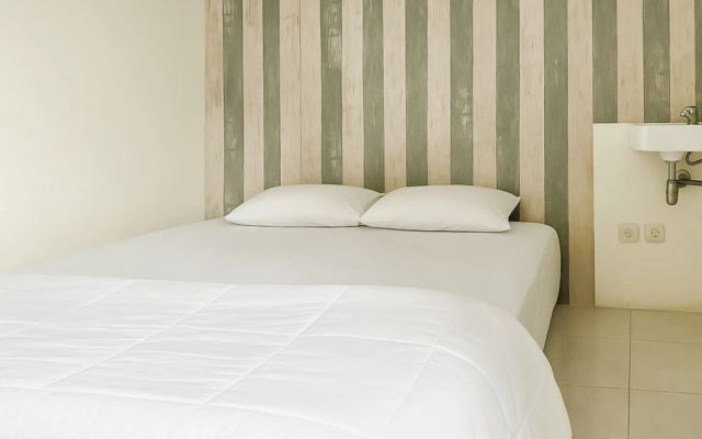 Quantum Guesthouse Tasikmalaya Mitra RedDoorz – Guest Rooms – Tasikmalaya
