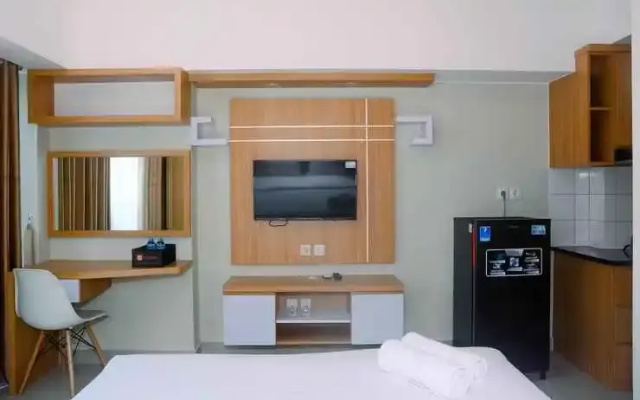 New Furnsihed Studio Room Apartment at Springlake Bekasi By Travelio