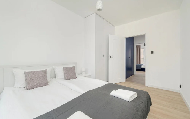 Wroclaw Dark Blue Apartment by Renters