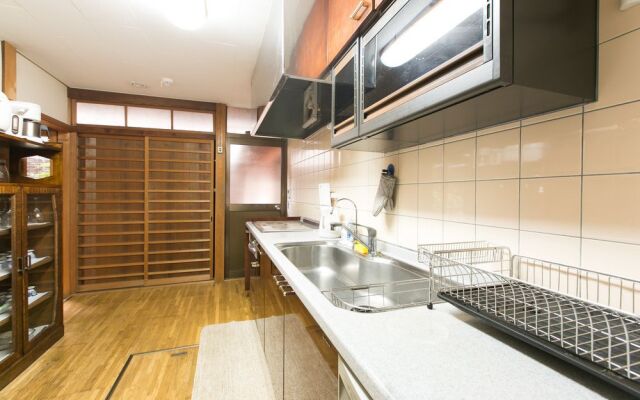 Nishinokyouharamachino Ie