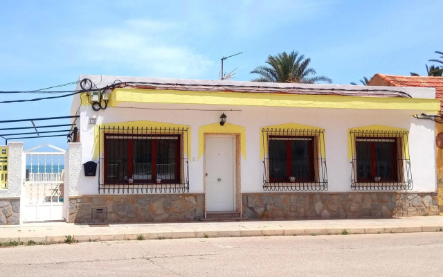 On the sandy uncrowded beach of Los Urrutias
