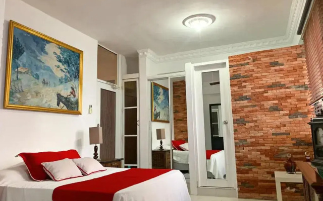 Malecon Rooms & Hotel