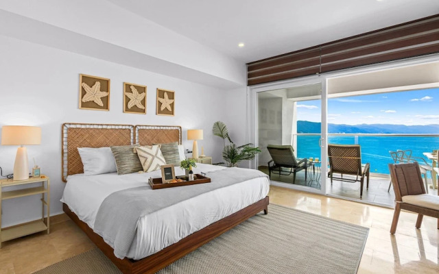 Stylish Beachfront 2BR - Balcony & Pools