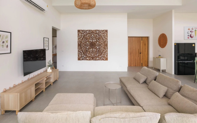 Tropical Poolside Retreat by Sea N' Rent