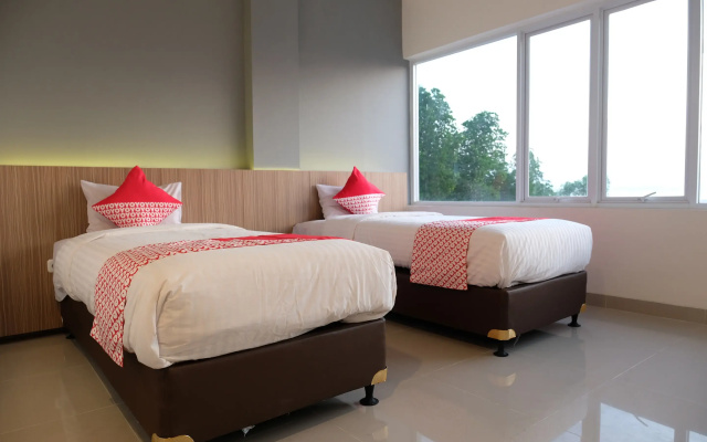 Purple Hotel by OYO Rooms