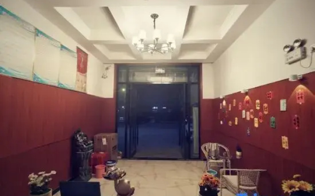 Ruxin Business Hotel (Chengwu Shengshi International Building Materials City)
