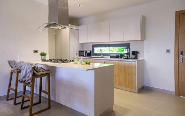 Modern and Spacious Condo Steps From the Beach