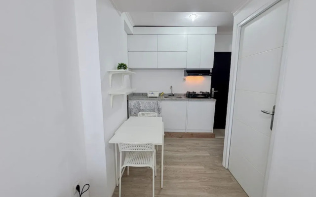 Compact and Restful 2BR at Menara Rungkut Apartment