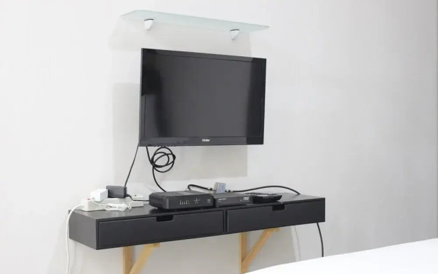 Compact Studio Room at Sudirman Suites Apartment