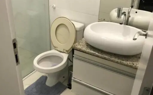 Casa de praia com piscina e churrasqueira - Indaiá Bertioga