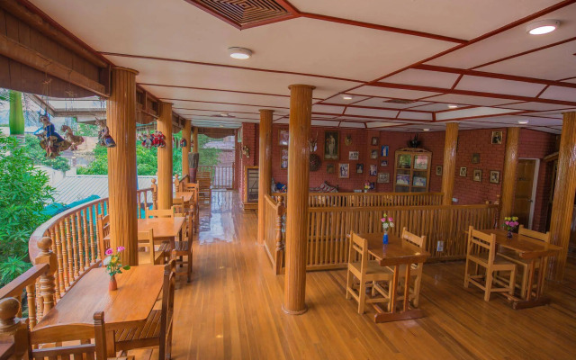 Teak Wood Hotel