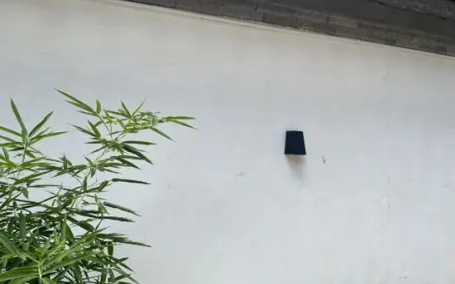 Lijiang Yuni Xiaoyuan Inn (Sanyi Airport)