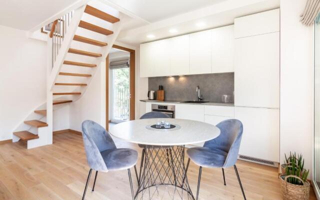 Happy Day Apartment, By Cohost