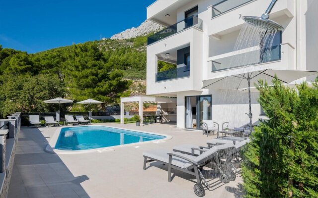 Amazing Apartment in Baska Voda With Wifi, Outdoor Swimming Pool and Heated Swimming Pool
