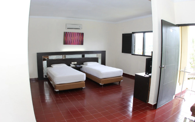 Danau Toba International Cottage