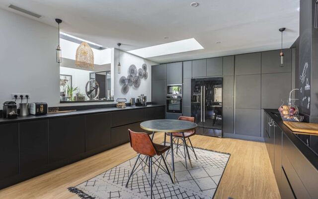 Stunning Home with Private Pool and Patio by GuestReady