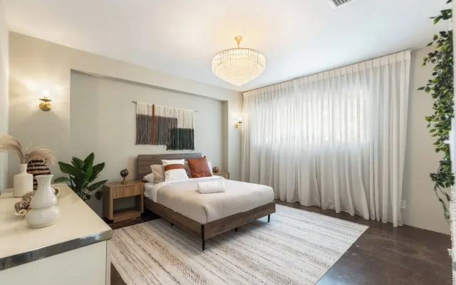 Stylish Hillside Retreat with Pool & Views