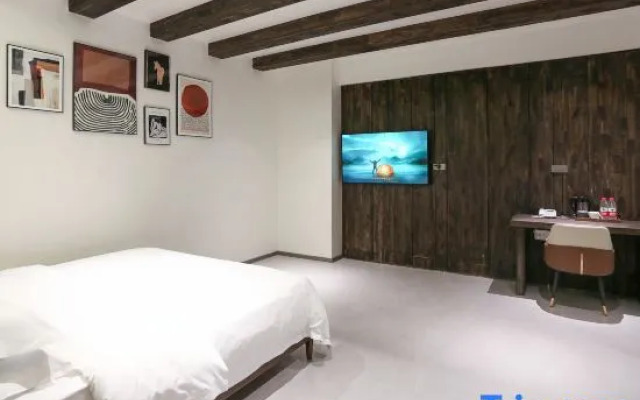 Weiman Hotel (Qingtai Century Plaza)