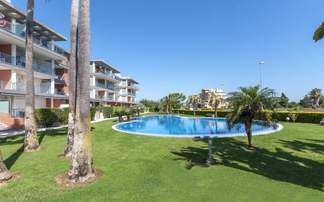 BREZO - Apartment with shared pool in Oliva Nova . Free WiFi