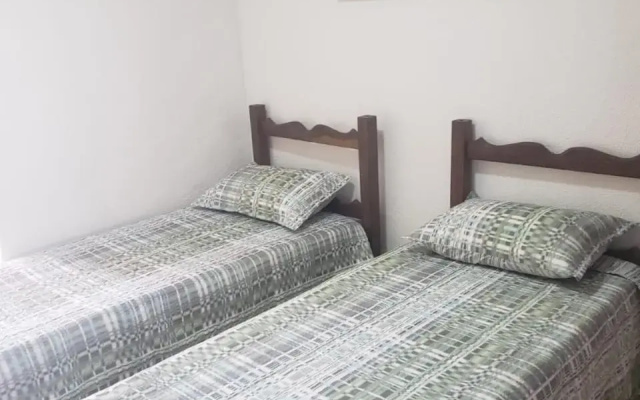 1 quarto 2 camas de solteiro