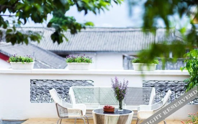 Zen Holiday Inn (Lijiang Ancient City Sifang Street)