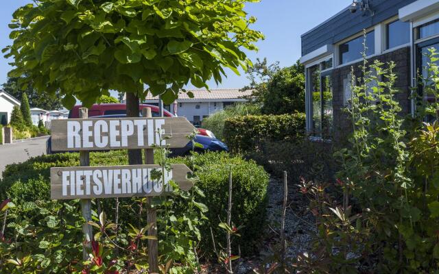 Heavenly Chalet in Sint Annaland with Terrace, Garden, BBQ