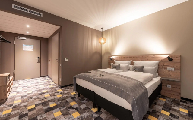 Отель Holiday Inn - the niu, Timber Esslingen, an IHG Hotel