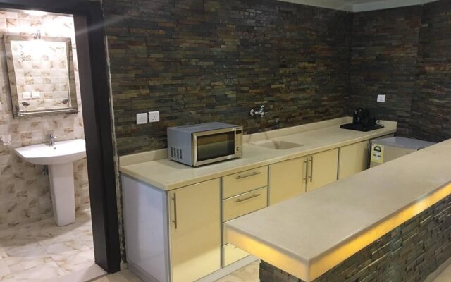 Rawda Suites Hotel )